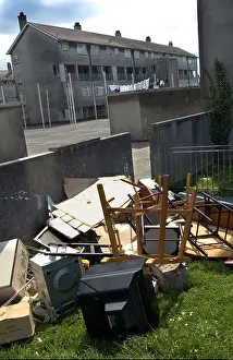Disorder Prints: Destroyed furniture thrown out of a flat from this rundown housing estate in Devonport Plymouth England