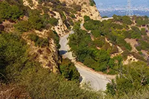 Griffith Park Prints: Detailed view of a curved road alongside hills in Griffith Park