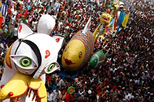 DHAKA, BANGLADESH - APRIL 14: Bangladeshi revelers march during a rally in celebration of the Bengali New Year