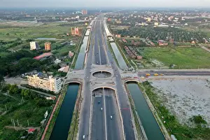 Expressway Prints: Dhaka, Bangladesh - July 19, 2023: Purbachal Expressway (300 feet road) is a 12