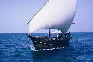 Blue Sea Prints: Dhow sailing on the blue Arabian Sea at Abu Dhabi, 1963