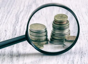 Saving Prints: diagram of coins and magnifying glass