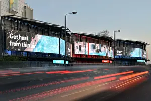 Companies Prints: Digital advertising hoardings promoting the domestic energy company E-on on the Talgarth Road