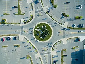 Crossroads Prints: Direct overhead aerial view of a 4-way roundabout in a city center