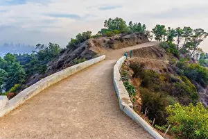 Winding Road Prints: Dirt pathway curving along a hill in Griffith Park