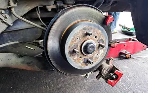 Inspect Prints: Disc brakes front of the car to use for the old and rusty