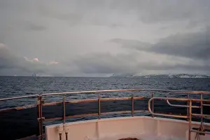 Brim Prints: Distant mountains, shot from boat on the arctic ocean in winter, northern Norway