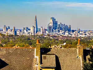 Urban Sprawl Prints: Distant view of London skyline from a suburban rooftop in Crystal Palace