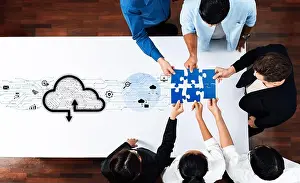 Networking Prints: A diverse group of professionals collaborates on a cloud technology project
