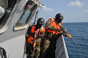 Multinational Prints: Djiboutian commandos board the patrol boat La Dague during an anti-piracy exercise in the Gulf of Tadjoura