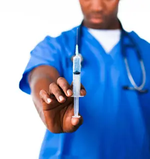 Disposable Prints: Doctor holding a syringe