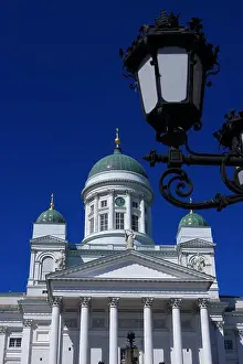 Whitewashed Prints: Dome and architectural details of The Helsinki Lutheran Cathedral against a clear blue sky background