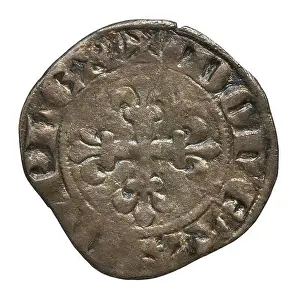 Emission Prints: A double denier parisis coin from the first emission