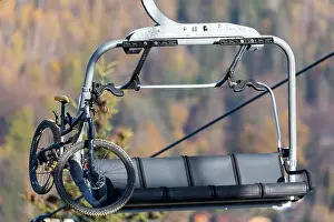 Outdoor Activities Prints: Downhill bicycle on a chairlift