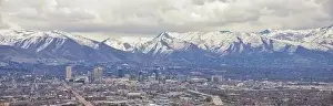 Mormonism Prints: Downtown Salt Lake City Panoramic view of Wasatch Front Rocky Mountains from airplane in early spring winter with