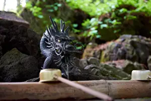 Shinto Prints: Dragon shaped water fountain at entrance of Towada Shinto shrine
