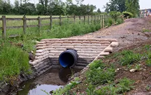 Construction Industry Prints: Drainage ditch at the side of a motorway in the UK