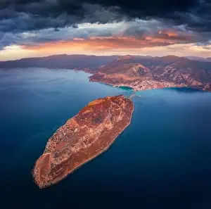 Dramatic summer view of Monemvasia island with Gefira town on background