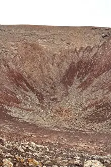 Scenic Background Prints: the Dramatic volcanic red deserted crater of Calderon Hondo volcano near to Corralejo