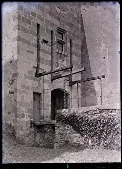 Heritage Conservation Prints: A detail of the drawbridge at Château de Bonneval in Coussac-Bonneval appears in a 1956 photograph by Marcel Maillard