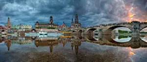 Dresden, Germany. Panoramic cityscape image of Dresden, Germany with reflection of the city in the Elbe river, during dramatic sunset
