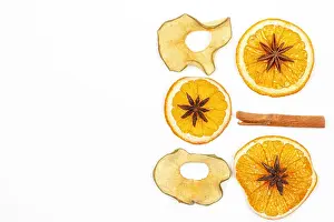 Smell Prints: Dried lemon cinnamon star anise on a light background