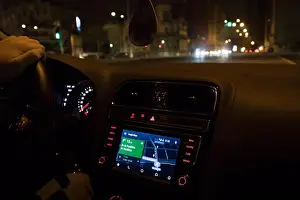Navigate Prints: Driving car with google maps gps on dashboard (Lisbon, Portugal)