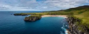A drone aerial panorama of the beautiful Silver Strand and horseshoe bay at Malin Beg on the Wild