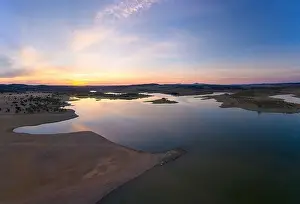 Reflection Lake Prints: Drone aerial panorama of a dam lake reservoir at sunset in Terena, Portugal