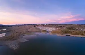 Reflection Lake Prints: Drone aerial panorama of a dam lake reservoir at sunset in Terena, Portugal