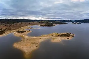 Carmona Prints: Drone aerial view of Idanha Dam Marechal Carmona landscape with beautiful blue lake water
