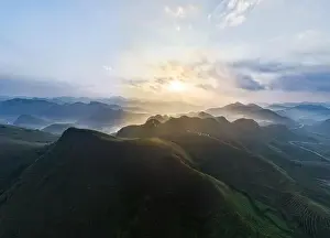 Rice Field Prints: Drone aerial view of landscape mountains view in summer season