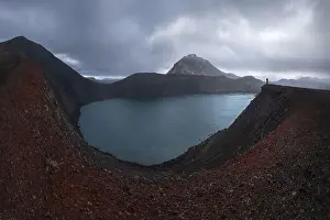 Grey Sky Prints: Drone capture of a vast moody lake nestled in the volcanic highlands of Iceland
