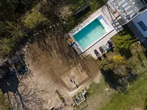Common Duckweed Prints: Drone flight over fresh earth area with grass grown next to pool construction site in April
