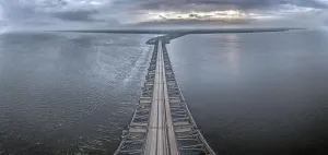 Hydro Prints: Drone image over the Haringvlietdam flood barrier near the Dutch town of Ouddorp against a cloudy morning sky