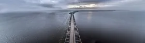 Hydro Prints: Drone image over the Haringvlietdam flood barrier near the Dutch town of Ouddorp against a cloudy morning sky