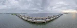 Hydro Prints: Drone image over the Haringvlietdam flood barrier near the Dutch town of Ouddorp against a cloudy morning sky