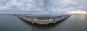 Hydro Prints: Drone image over the Haringvlietdam flood barrier near the Dutch town of Ouddorp against a cloudy morning sky