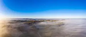Nightmare Prints: Drone image of morning ground fog over fields in the German province of North Hesse near the village of Rhoden