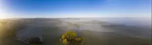 Nightmare Prints: Drone image of morning ground fog over fields in the German province of North Hesse near the village of Rhoden