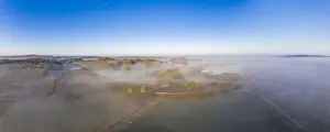 Nightmare Prints: Drone image of morning ground fog over fields in the German province of North Hesse near the village of Rhoden
