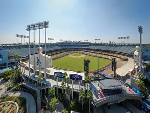 Drone images of Dodger Stadium with the Los Angeles skyline visible in a few shots