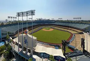 Drone images of Dodger Stadium with the Los Angeles skyline visible in a few shots