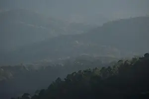 Drone-like aerial view of a scenic mountainous woodland in a north of Thailand