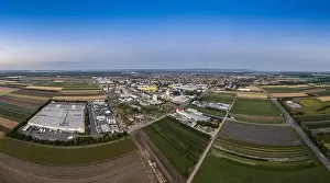 Darmstadt Prints: Drone panorama over German village Griesheim near Darmstadt in southern Hesse in the evening during sunset