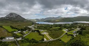 Lough Prints: A drone panorama landcape of the village of Money Beg and Errigal Mountain on Lough Nacung Upper