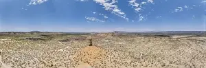 Sky Landscape Prints: Drone panorama of the landscape around the famous Vingerklip rock needle in northern Namibia during the day in summer