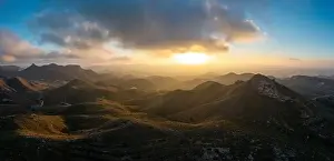 Drone panorama landscape of semi-desert mountain landscape in southern Spain at sunset