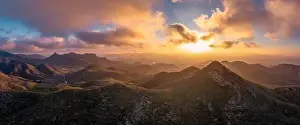 Drone panorama landscape of semi-desert mountain landscape in southern Spain at sunset