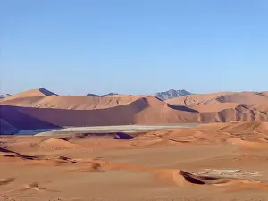Namib Prints: Drone panorama over the Sossusvlei and the surrounding dunes of the Namib Desert in Namibia during the day in summer